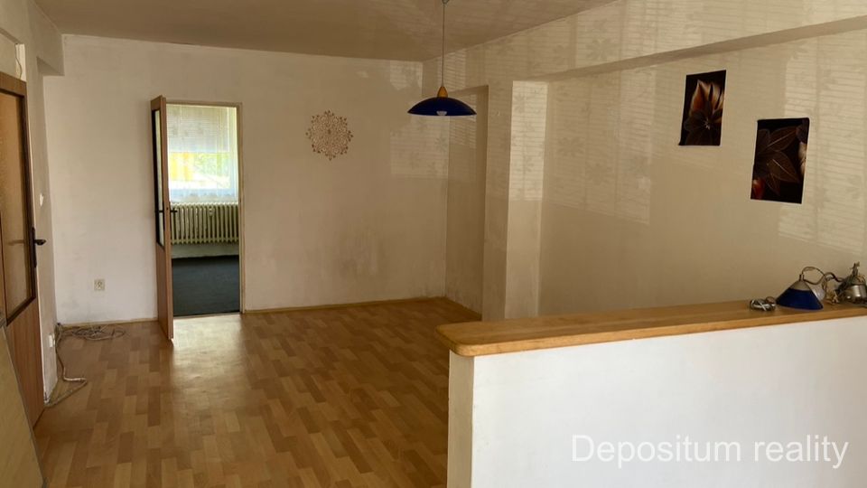 Prostorný přízemní byt u parku